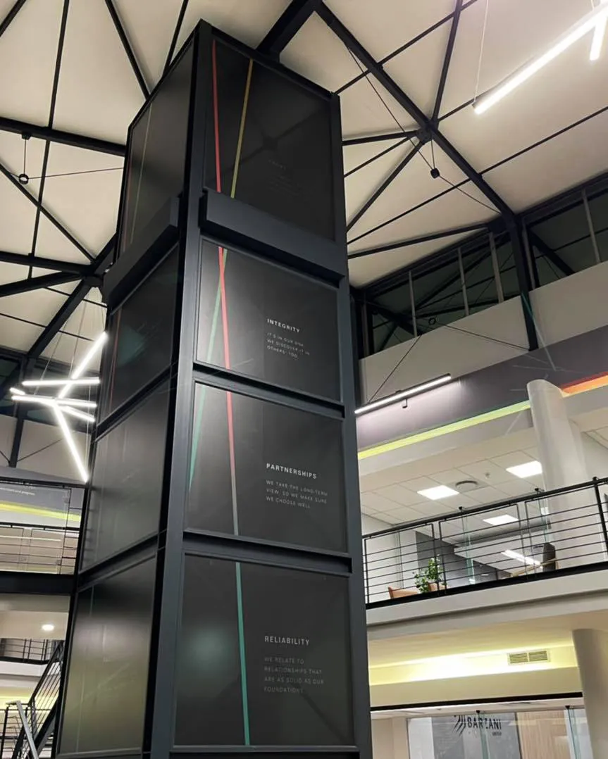 Lift shaft branding, interior — signage and branding by Stiek Industries