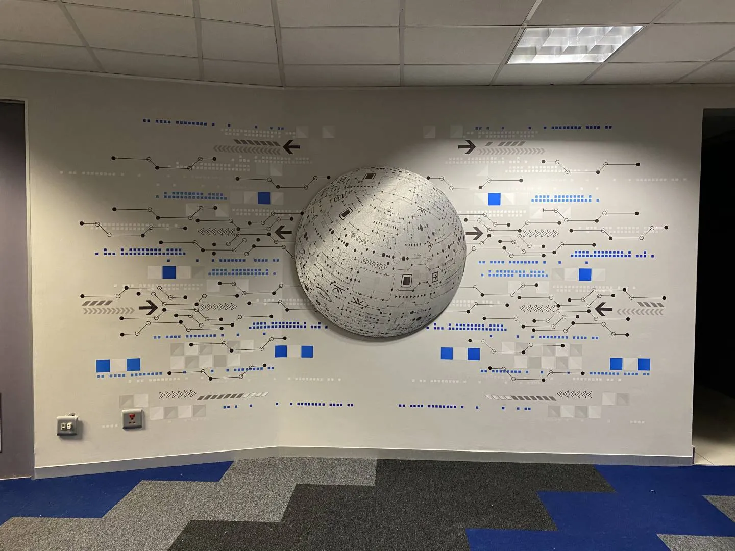 3D globe technology wallpaper — signage and branding by Stiek Industries